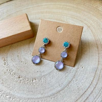 Boucles d oreilles bleues et argentees