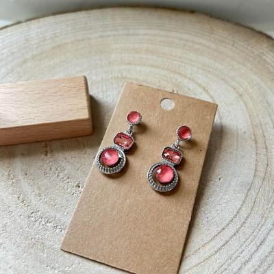 Boucles d oreilles roses et argentees